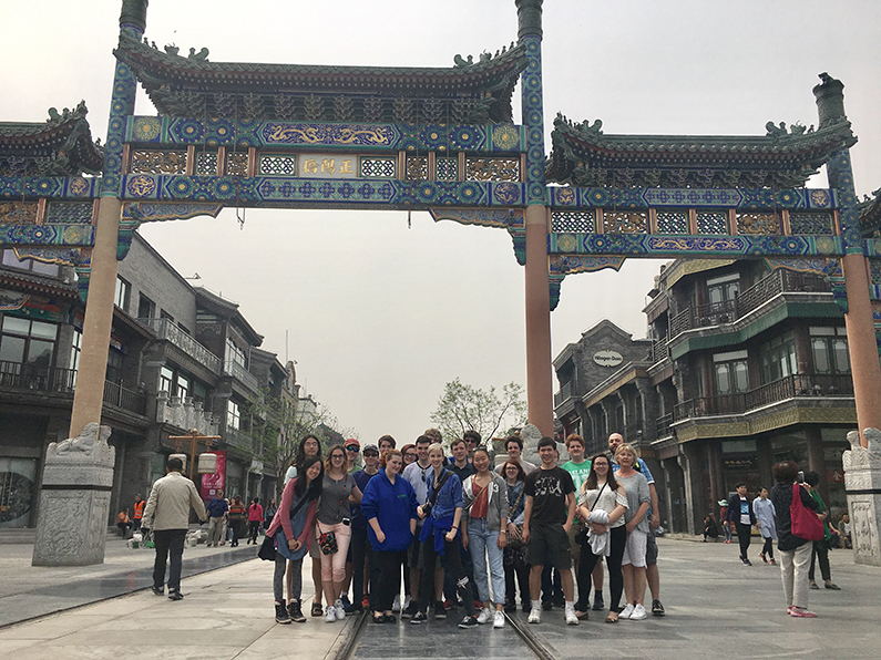 Photo of TVHS staff and students at Bejing's Front Gate.