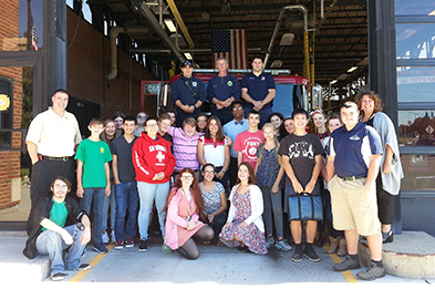 Photo of TVHS students in front of fire truck.