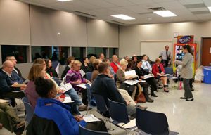 Photo of educators listening to a presentation.