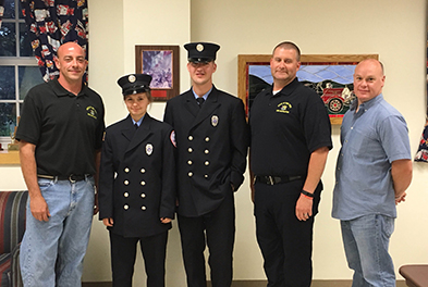 Photo of firefighters in uniform.