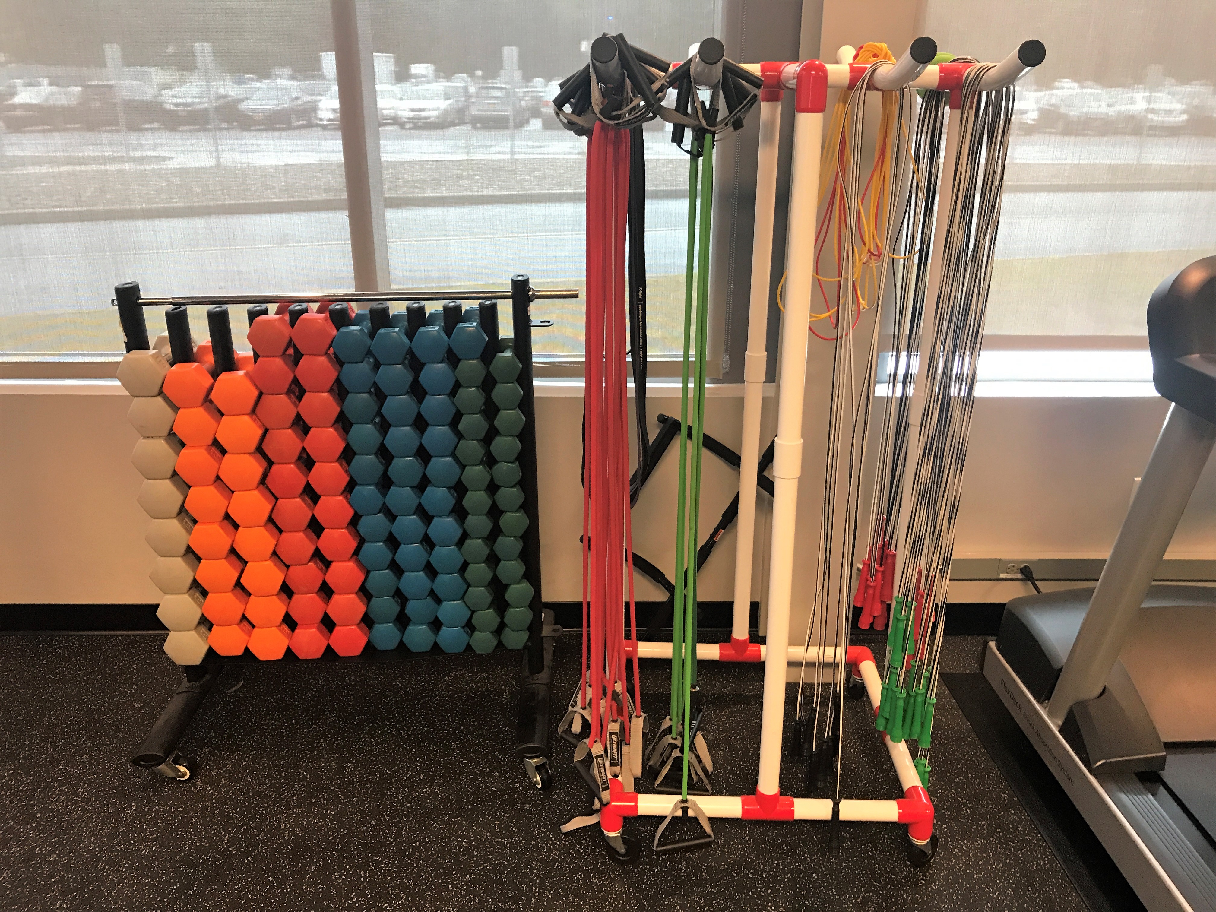 Photo of free weights and bands in fitness center