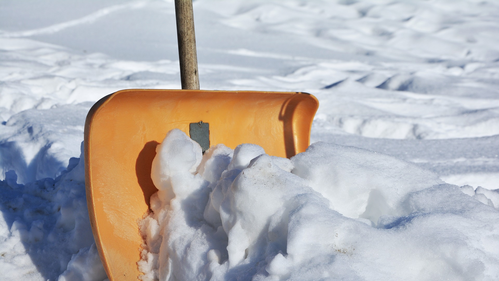 photo of snow shovel pushing snow