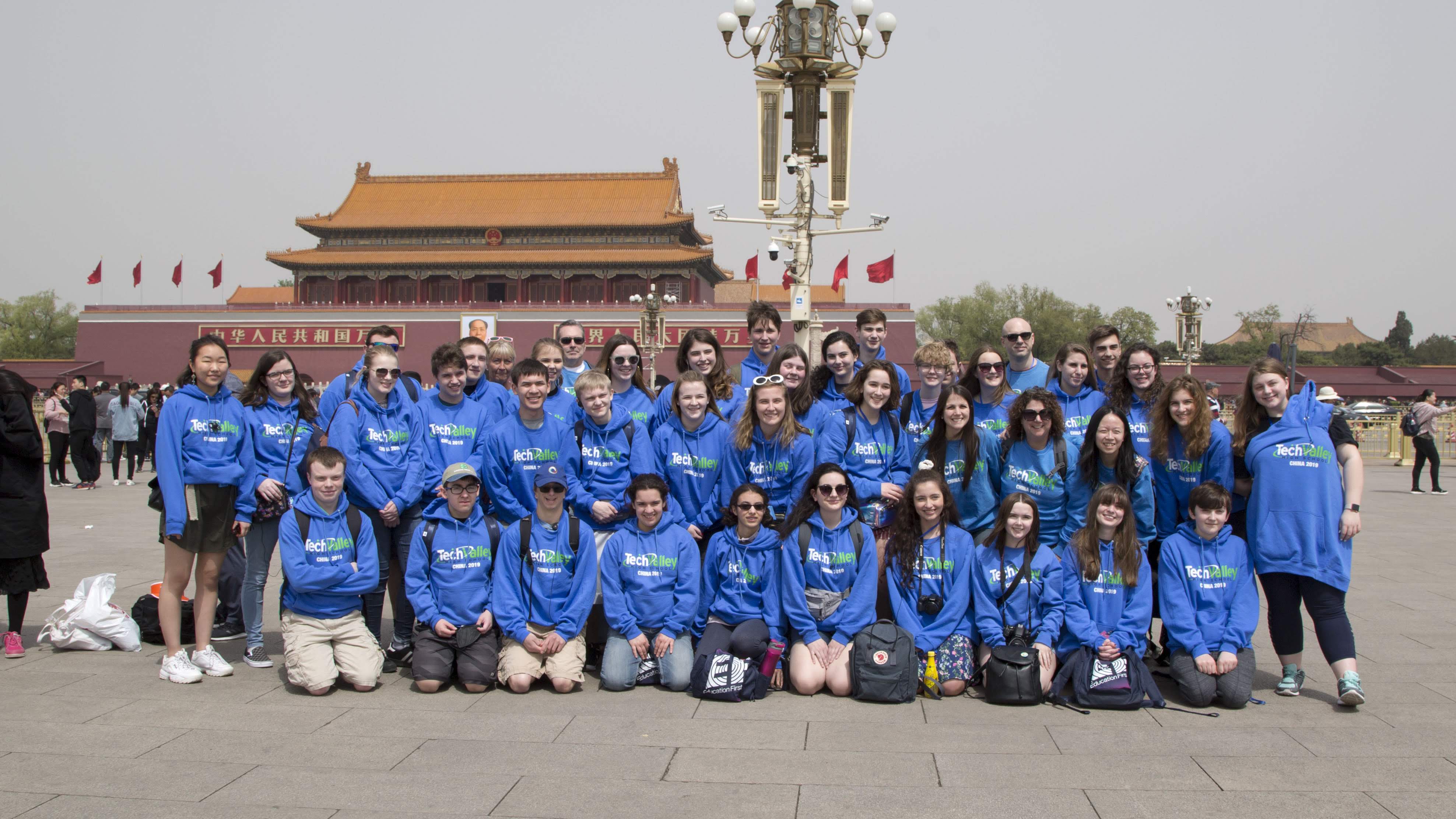 Group photo of TVHS staff and students outside the forbidden city in China