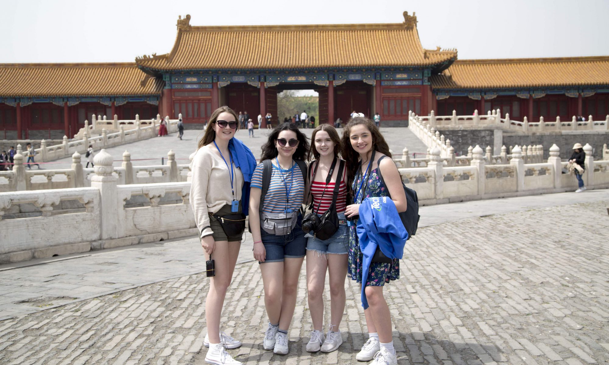 Photo of four students in China